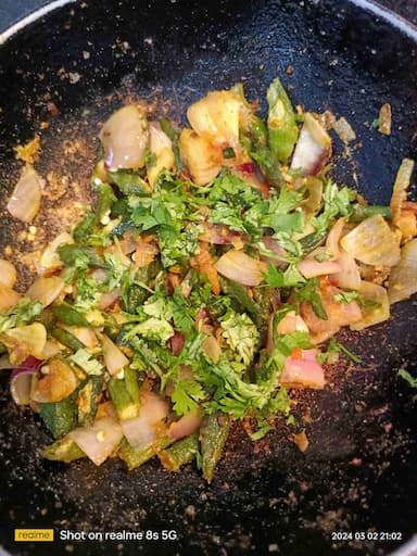 Tasty Bhindi do Pyaza cooked by COOX chefs cooks during occasions parties events at home