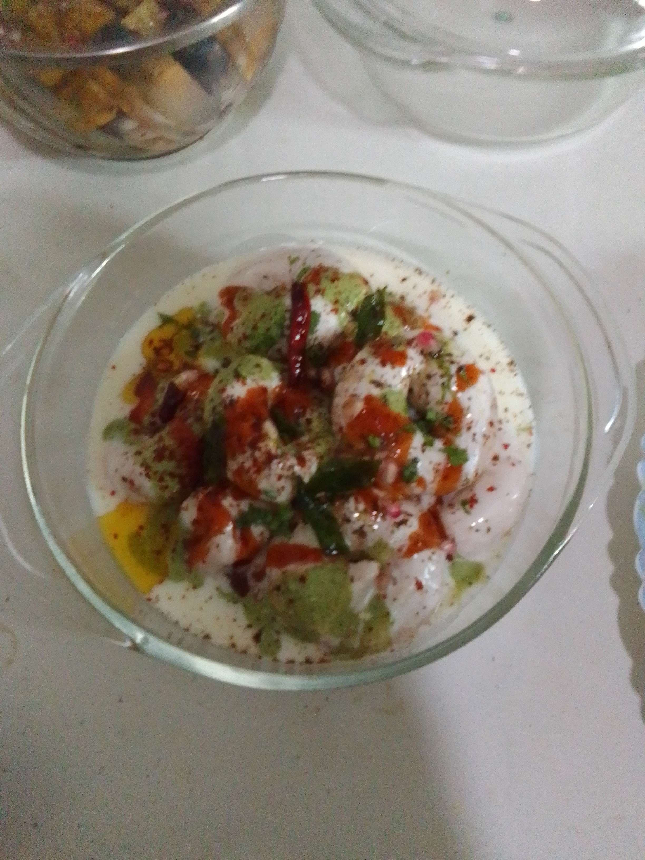 Tasty Dahi Vada cooked by COOX chefs cooks during occasions parties events at home