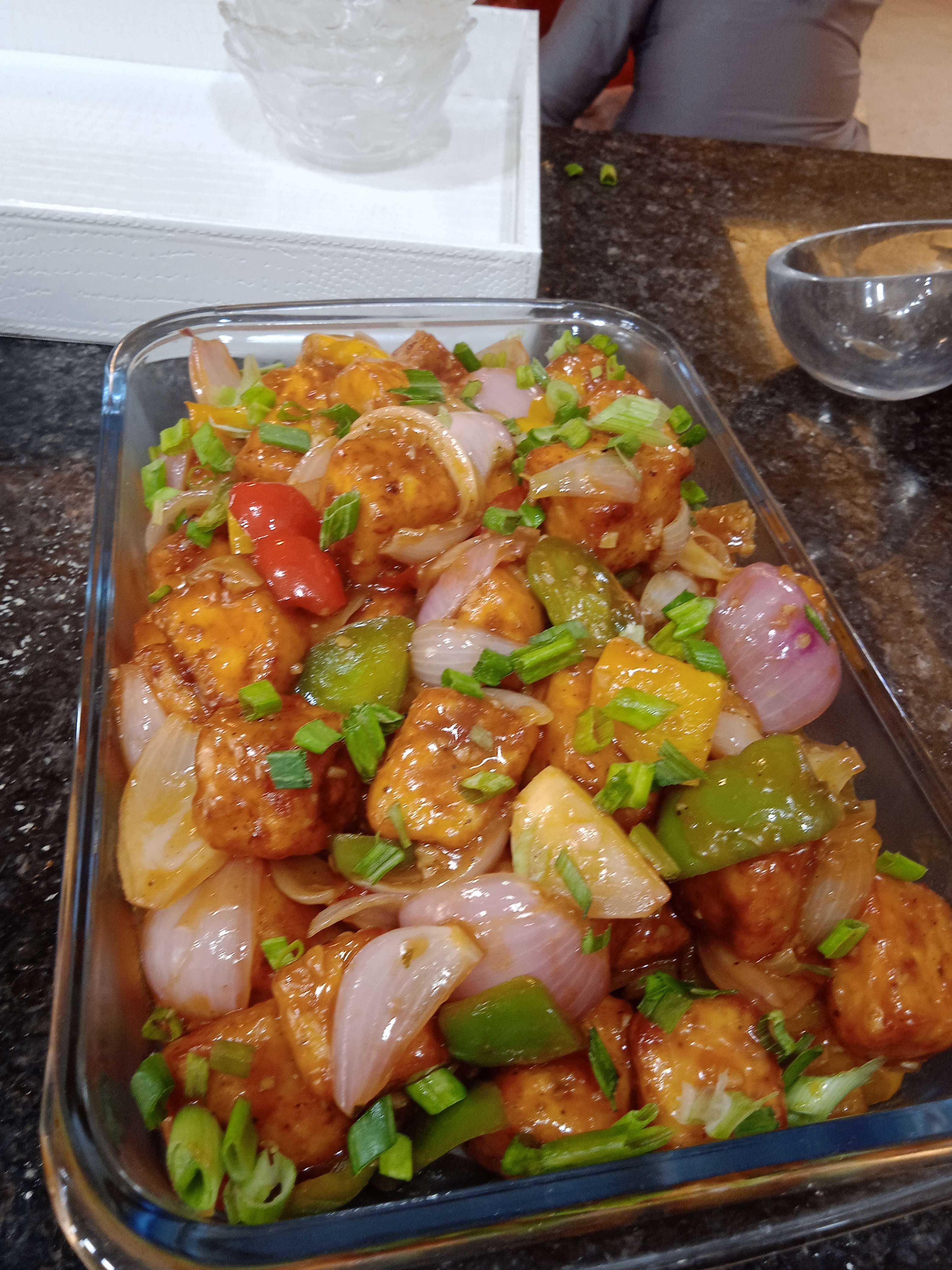 Tasty Chilli Paneer (Dry) cooked by COOX chefs cooks during occasions parties events at home