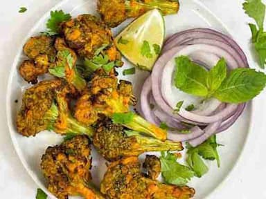 Tasty Tandoori Broccoli cooked by COOX chefs cooks during occasions parties events at home