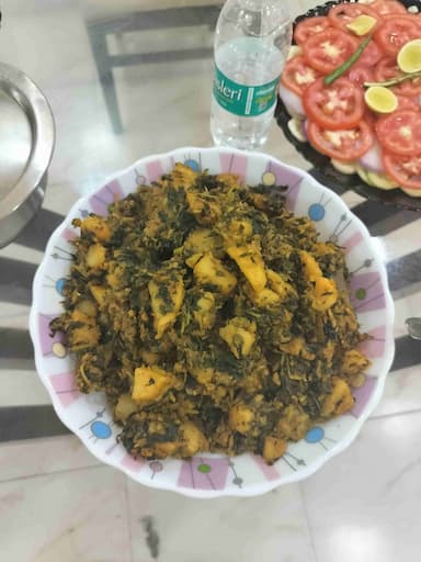 Tasty Aloo Methi cooked by COOX chefs cooks during occasions parties events at home