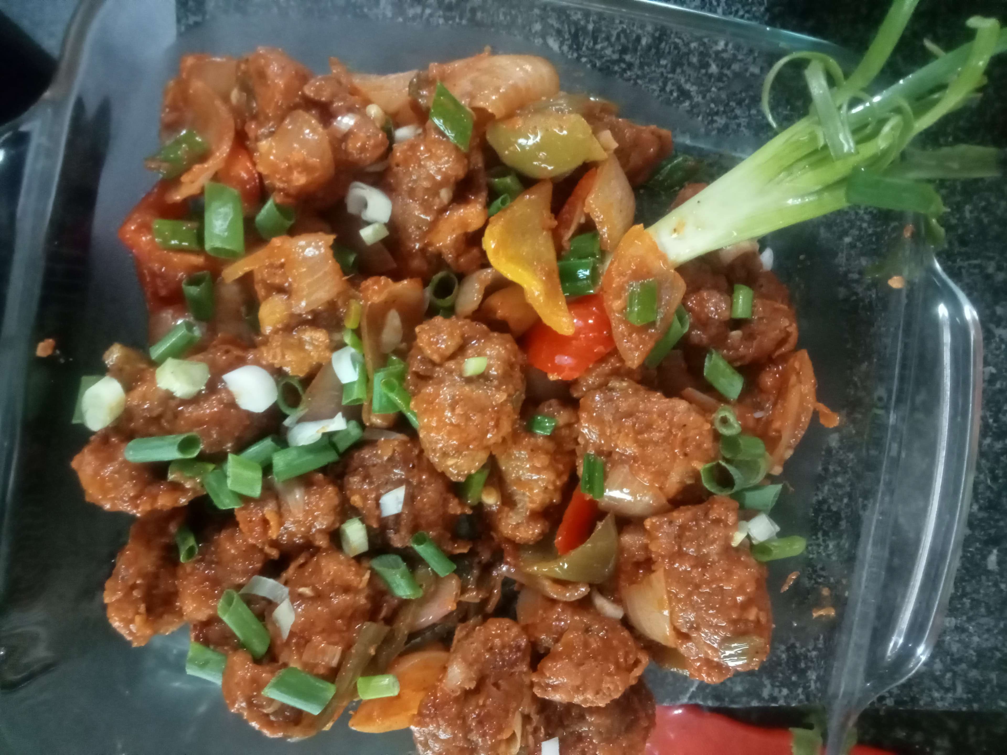 Tasty Chilli  Chicken cooked by COOX chefs cooks during occasions parties events at home