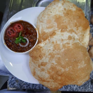 Tasty Bhature cooked by COOX chefs cooks during occasions parties events at home