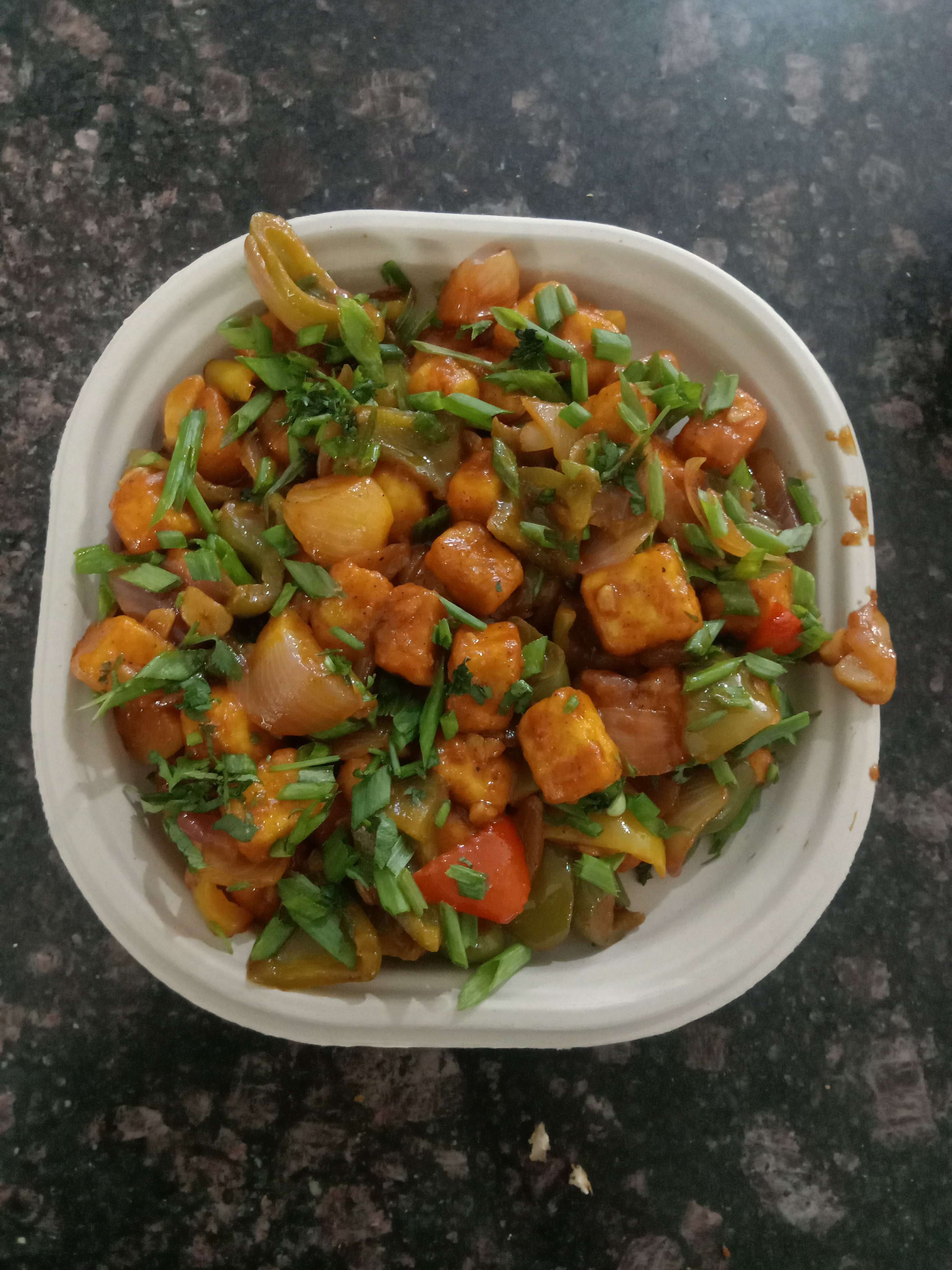 Tasty Chilli Paneer (Dry) cooked by COOX chefs cooks during occasions parties events at home