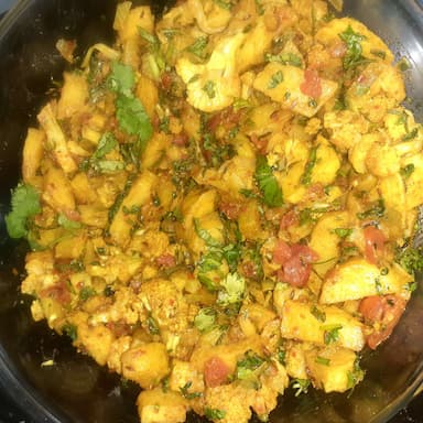 Tasty Aloo Gobhi cooked by COOX chefs cooks during occasions parties events at home