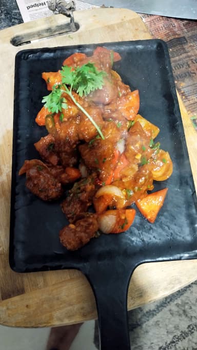 Tasty Chilli Pork with Peppers cooked by COOX chefs cooks during occasions parties events at home