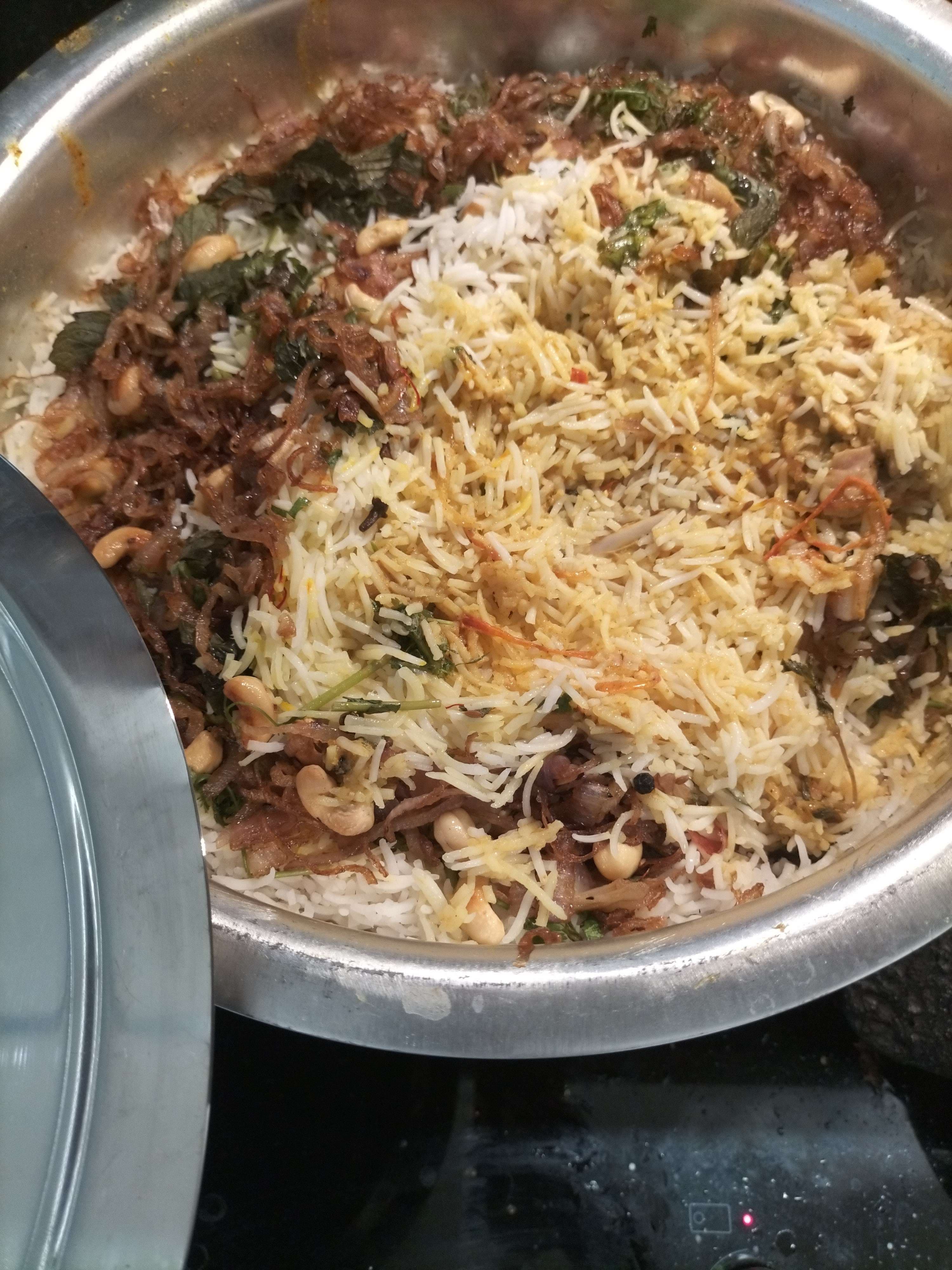 Tasty Chicken Biryani cooked by COOX chefs cooks during occasions parties events at home