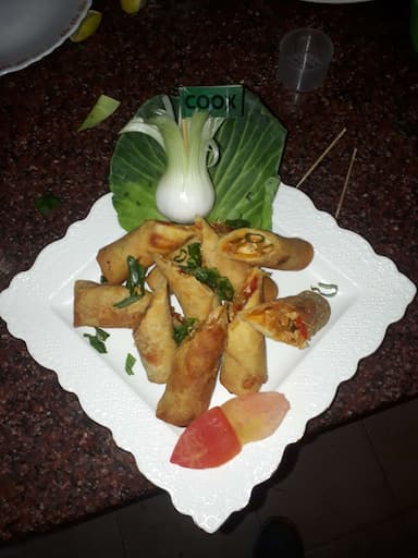 Delicious Chicken Spring Rolls prepared by COOX