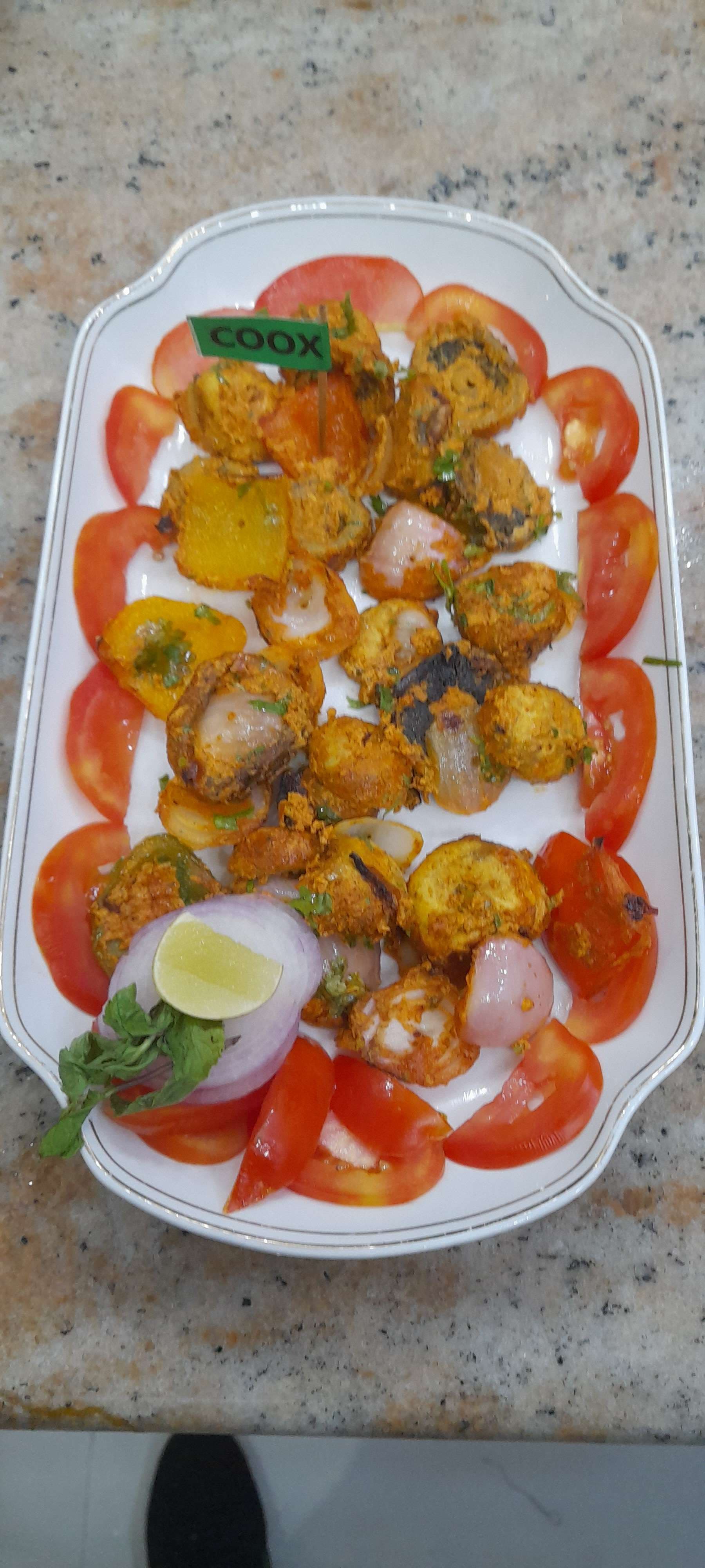 Tasty Mushroom Tikka cooked by COOX chefs cooks during occasions parties events at home