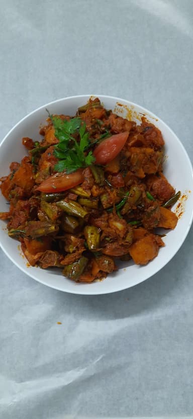 Tasty Aloo Parwal cooked by COOX chefs cooks during occasions parties events at home