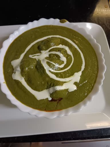 Tasty Palak Kofta cooked by COOX chefs cooks during occasions parties events at home