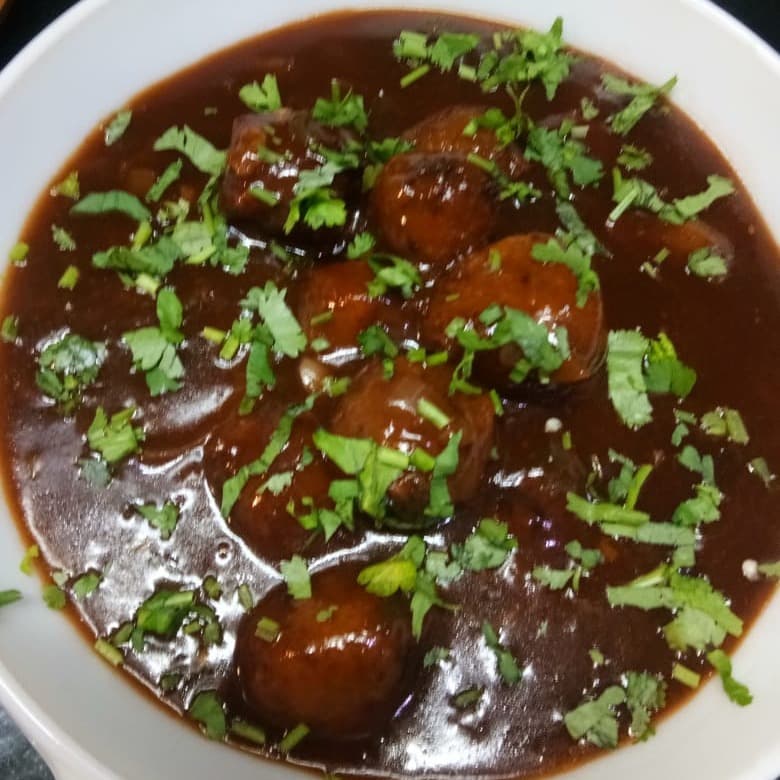 Tasty Veg Manchurian (Gravy) cooked by COOX chefs cooks during occasions parties events at home