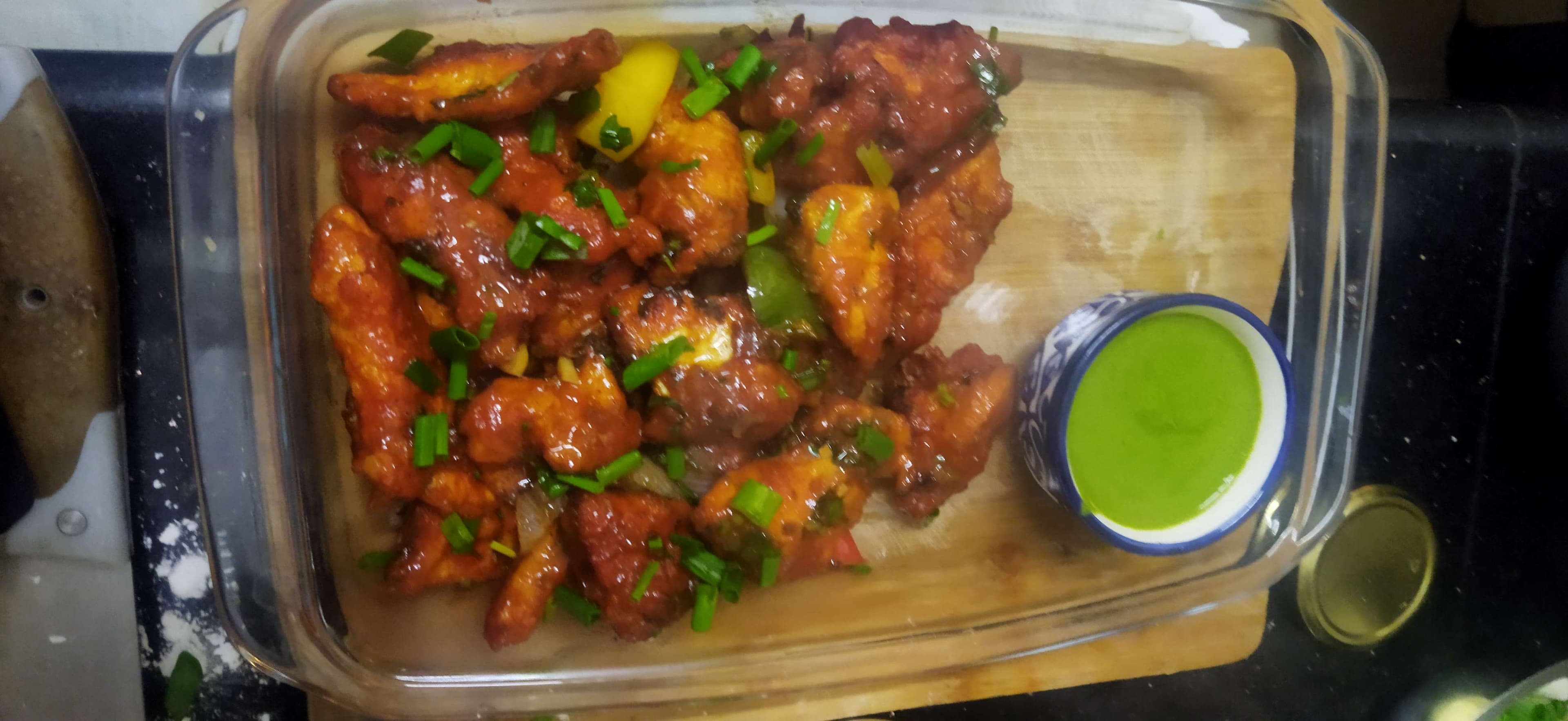 Tasty Chilli  Chicken cooked by COOX chefs cooks during occasions parties events at home