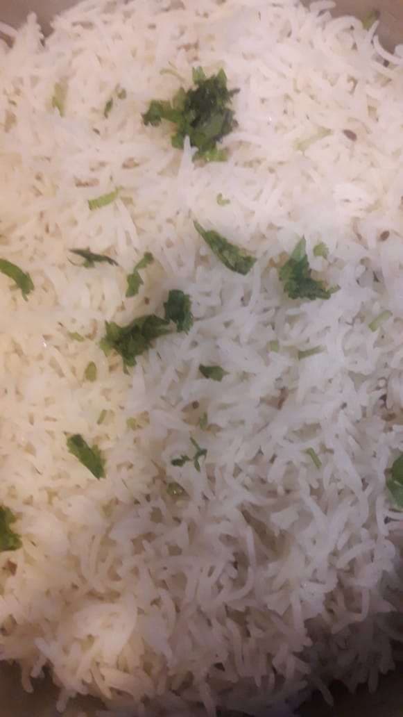 Tasty Jeera Rice cooked by COOX chefs cooks during occasions parties events at home