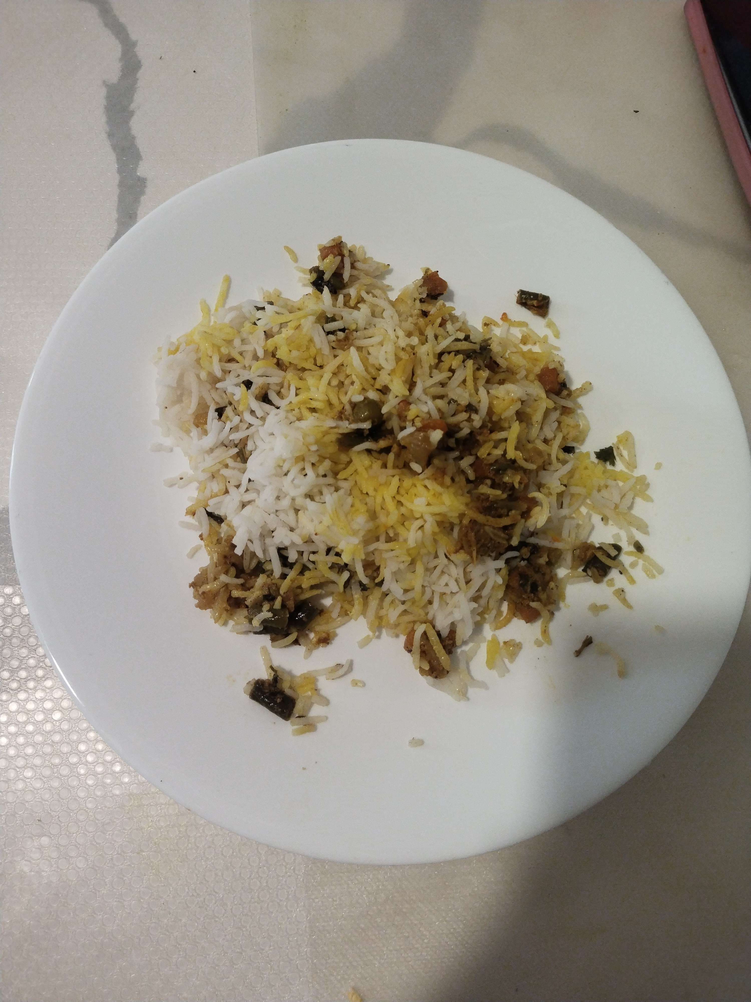Tasty Veg Biryani cooked by COOX chefs cooks during occasions parties events at home