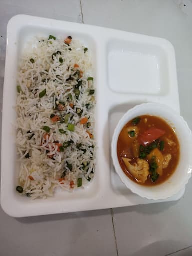 Tasty Schezwan Fried Rice cooked by COOX chefs cooks during occasions parties events at home