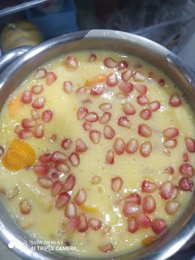 Tasty Fruit Custard cooked by COOX chefs cooks during occasions parties events at home