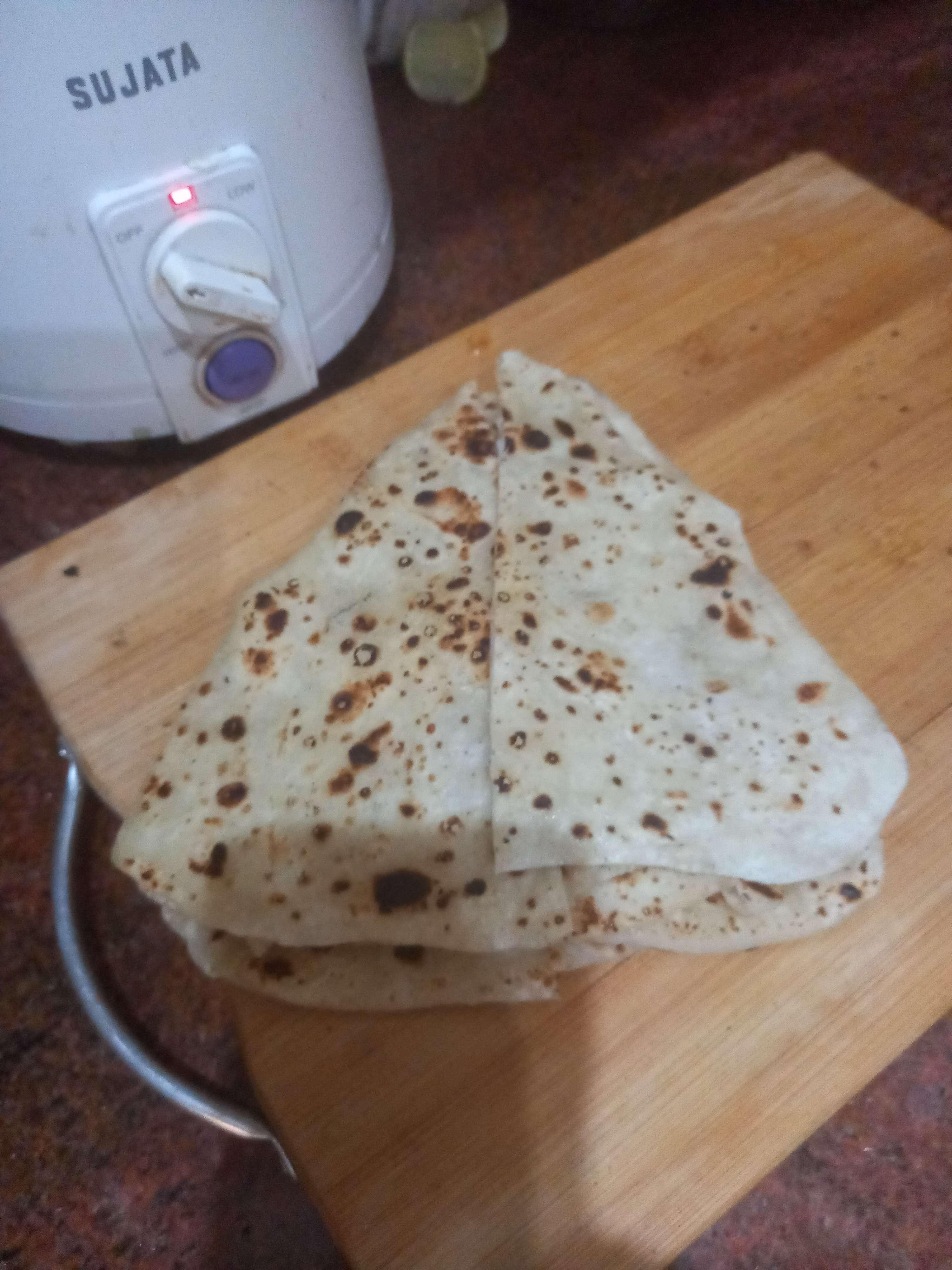 Delicious Butter Naan prepared by COOX