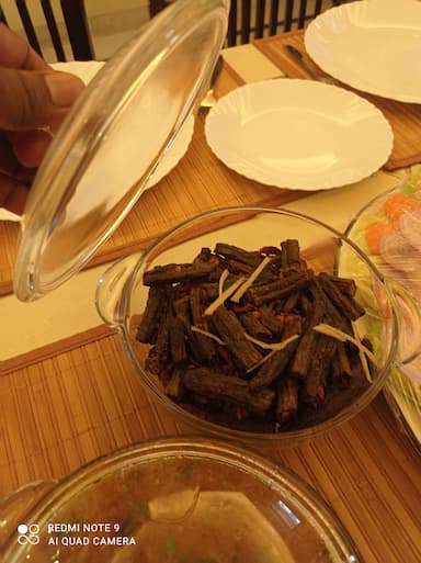 Tasty Kurkuri Bhindi cooked by COOX chefs cooks during occasions parties events at home