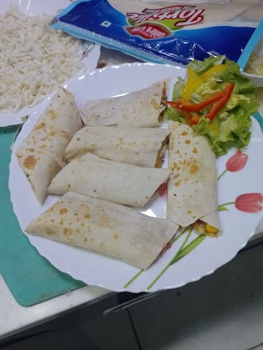 Tasty Veg Burritos cooked by COOX chefs cooks during occasions parties events at home