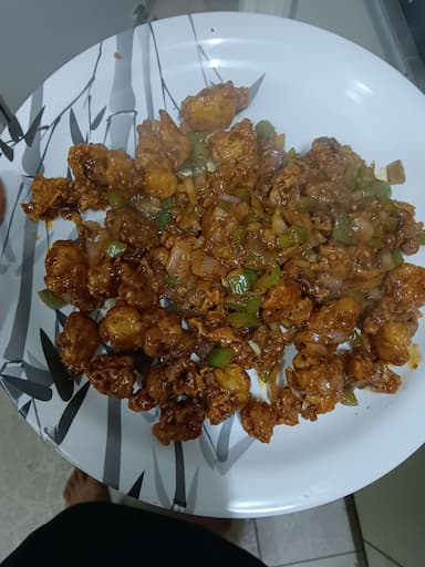 Tasty Gobi Manchurian cooked by COOX chefs cooks during occasions parties events at home