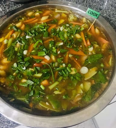 Tasty Mix Veg in Schezwan Sauce cooked by COOX chefs cooks during occasions parties events at home