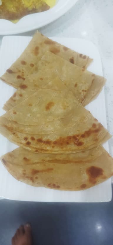 Delicious Malabar Parotta prepared by COOX