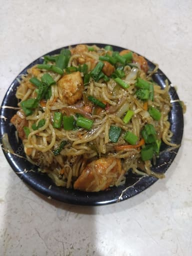 Delicious Chicken Chilli Garlic Noodles prepared by COOX