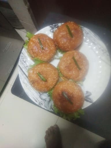 Delicious Paneer Tikka Burger prepared by COOX