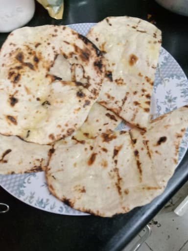 Delicious Naan (Butter / Garlic) prepared by COOX