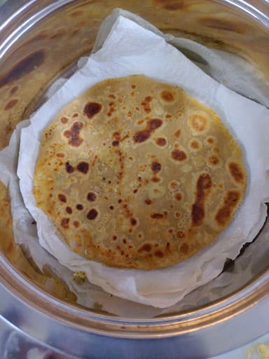 Delicious Stuffed Parathas prepared by COOX