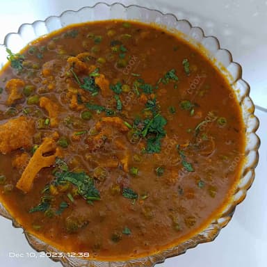 Delicious Gobhi Matar prepared by COOX