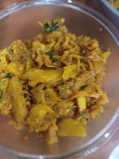 Delicious Aloo Patta Gobhi prepared by COOX