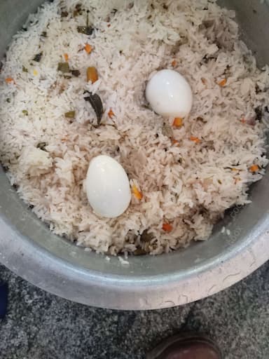 Delicious Egg Biryani prepared by COOX