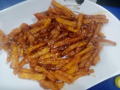 Delicious Honey Chilly Potato prepared by COOX