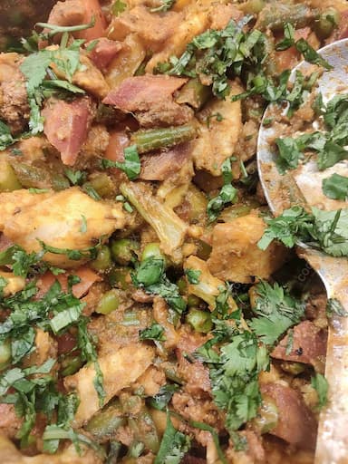 Delicious Aloo Patta Gobhi prepared by COOX