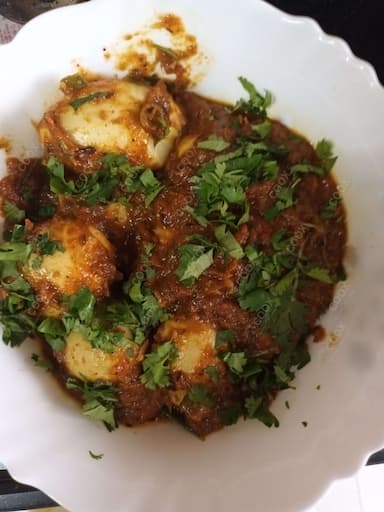 Delicious Egg Curry prepared by COOX