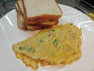 Delicious Bread Omelette prepared by COOX