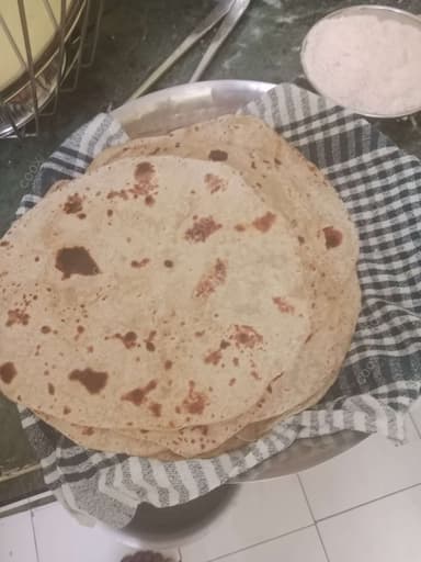 Delicious Tawa Rotis prepared by COOX