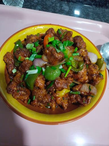 Delicious Chilli Chicken prepared by COOX