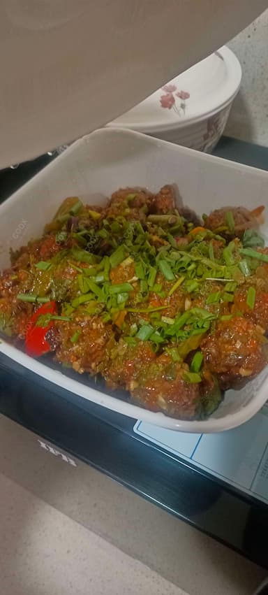 Delicious Veg Manchurian (Dry) prepared by COOX
