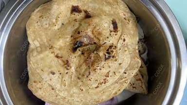 Delicious Lachha Parantha & Roti prepared by COOX