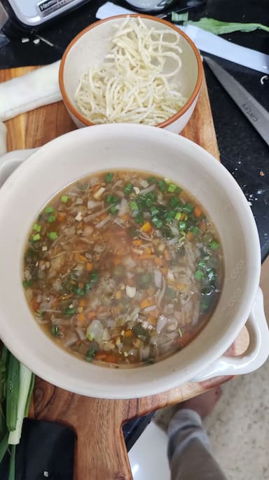 Delicious Vegetable Manchow Soup prepared by COOX