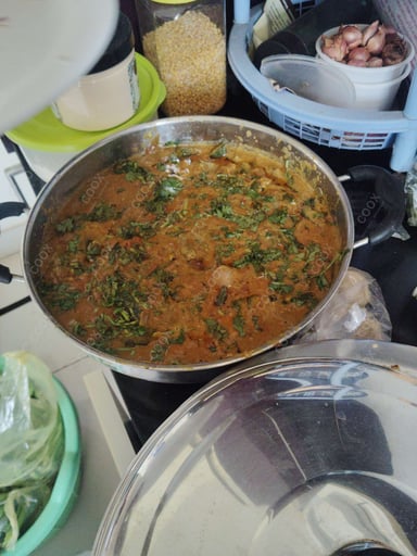 Tasty Bhindi do Pyaza cooked by COOX chefs cooks during occasions parties events at home