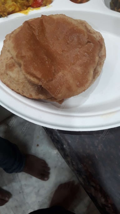 Tasty Pooris & Bedmis cooked by COOX chefs cooks during occasions parties events at home