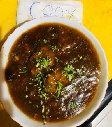 Tasty Veg Manchurian (Gravy) cooked by COOX chefs cooks during occasions parties events at home