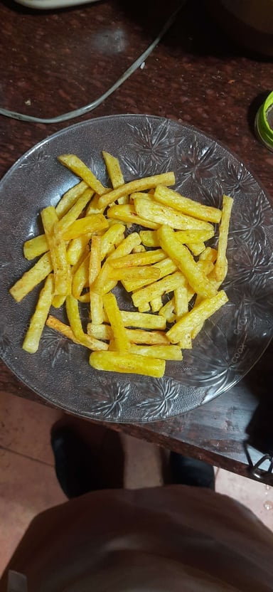Tasty French Fries cooked by COOX chefs cooks during occasions parties events at home