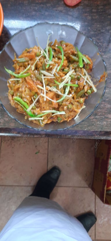 Tasty Kurkuri Bhindi cooked by COOX chefs cooks during occasions parties events at home