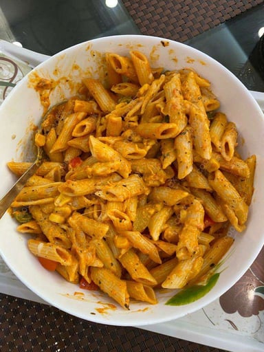 Tasty Pasta in Pink Sauce cooked by COOX chefs cooks during occasions parties events at home