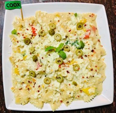 Tasty Pasta in White Sauce cooked by COOX chefs cooks during occasions parties events at home
